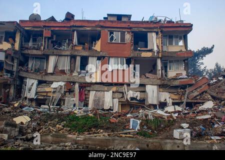 Hatay, Turkey. 8th Feb, 2023. View of a destroyed residential building. Turkey and Syria have experienced the most severe earthquakes to hit the region in almost a century. After a 7.8 magnitude earthquake in southeast Turkey, a second 7.7 magnitude earthquake occurred in northern Syria. It is reported that more than 30,000 people lost their lives as a result of the earthquakes and the death toll continues to rise. (Credit Image: © Yusuf Belek/SOPA Images via ZUMA Press Wire) EDITORIAL USAGE ONLY! Not for Commercial USAGE! Stock Photo