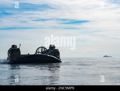 Atlantic Ocean. 8th Feb, 2023. Sailors assigned to Assault Craft Unit (ACU) Four operate landing craft air cushions (LCAC) during recovery efforts of a high-altitude balloon in the Atlantic Ocean, Feb. 8, 2023. At the direction of the President of the United States and with the full support of the Government of Canada, U.S. fighter aircraft under U.S. Northern Command authority engaged and brought down a high altitude surveillance balloon within sovereign U.S. airspace and over U.S. territorial waters Feb. 4, 2023. Active duty, Reserve, National Guard, and civilian personnel planned and e Stock Photo