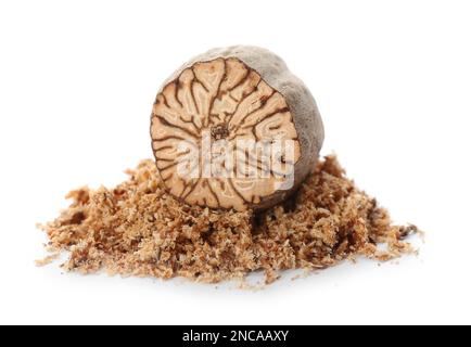 Grated nutmeg and seed isolated on white Stock Photo