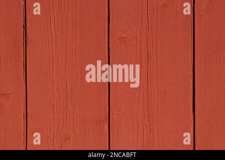 Red background from a wooden board old rustic fence or a wall Stock Photo
