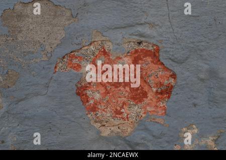 Pastel red gray Horizontal Wall Texture Urban Old Brick Wall Background. Vintage Gray Retro Plaster Wall Structure. Grungy Shabby Uneven Solid Paint Stock Photo