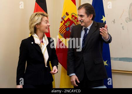 Spain's Labour Minister Valeriano Gomez, right, and German Labour Minister Ursula von der Leyen, are seen during the Spain-Germany one day summit at the Moncloa Palace on Thursday Feb. 3, 2011. (AP Photo/Arturo Rodriguez)