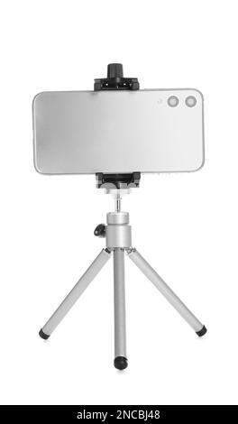 Smartphone fixed to tripod on white background Stock Photo