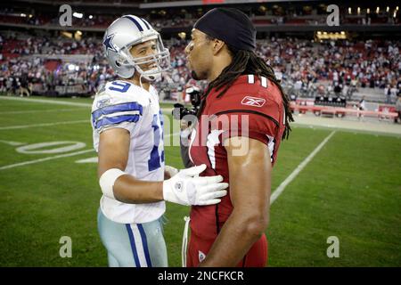 Dallas Cowboyts tight end Jason Witten (82) talks with quarterback Tony Romo  (9) during Cowboys training camp at the Alamo Dome in San Antonio, Texas,  Friday, July 29, 2011. (Photo by Paul