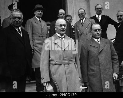 The German ministers Dr. Heinrich Bruening and Dr. Julius Curtius leaving for Chequers, United Kingdom, from London, on June 6, 1931, where they will hold important discussions with the prime minister and others. (AP Photo/Ferg)