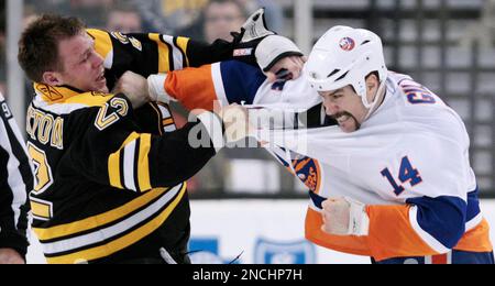 Boston Bruins left wing Shawn Thornton (22) and Philadelphia Flyers left  wing Daniel Carcillo (13) square off in the first period of the 2010  Bridgestone NHL Winter Classic at Fenway Park in