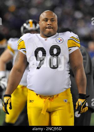 Cleveland Brown running back Jason Wright (29) fumbles the ball after being  tackled by Pittsburgh Steelers corner back Bryant McFadden (20) and  defensive tackle Casey Hampton (98) during the 3rd quarter at