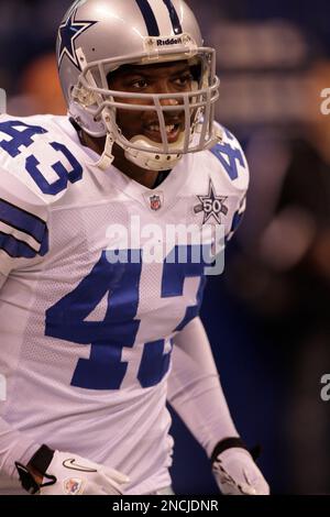 Dallas Cowboys linebacker Sean Lee (50) is congratulated by linebacker  DeMarcus Ware (94) and safety Gerald Sensabaugh (43) after getting a tackle  for a Chicago Bears loss at Cowboy's Stadium in Arlington