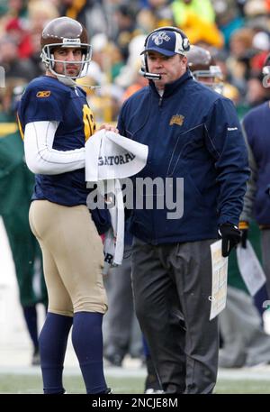 Green Bay Packers head coach Mike McCarthy talks to quarterback