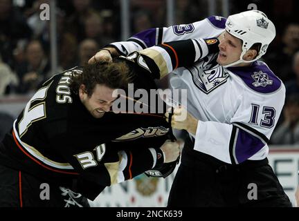 anaheim-ducks-left-wing-aaron-voros-left-fights-against-los-angeles-kings-left-wing-kyle-clifford-13-in-the-first-period-of-an-nhl-hockey-game-in-anaheim-calif-monday-nov-29-2010-ap-photoalex-gallardo-2nck639.jpg