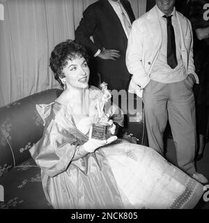 Gina Lollobrigida Italian actress sitting in the back of a car Stock ...