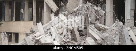 Industrial concrete building destroyed by an earthquake Stock Photo
