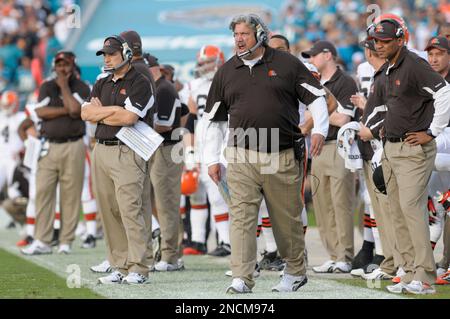 Cleveland Browns run game coordinator/running backs coach Stump Mitchell,  left, and running back Jerome Ford (34) leave the field after a preseason  NFL football game against the Jacksonville Jaguars, Friday, Aug. 12,