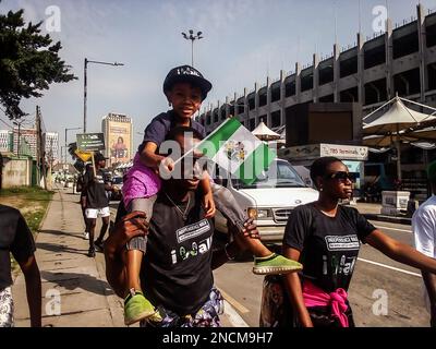 Participants during the Independence Walk from Tafawa Balewa Square (TBS) to the American Embassy to commemorate the 62nd independence anniversary of Nigeria at Tafawa Balewa Square. Lagos, Nigeria. Stock Photo