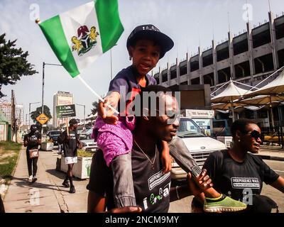 Participants during the Independence Walk from Tafawa Balewa Square (TBS) to the American Embassy to commemorate the 62nd independence anniversary of Nigeria at Tafawa Balewa Square. Lagos, Nigeria. Stock Photo