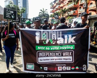 Participants during the Independence Walk from Tafawa Balewa Square (TBS) to the American Embassy to commemorate the 62nd independence anniversary of Nigeria at Tafawa Balewa Square. Lagos, Nigeria. Stock Photo