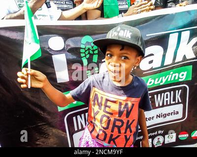 Participants during the Independence Walk from Tafawa Balewa Square (TBS) to the American Embassy to commemorate the 62nd independence anniversary of Nigeria at Tafawa Balewa Square. Lagos, Nigeria. Stock Photo