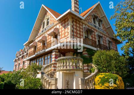 Arcachon, France, Scenes, The Ville d'Hiver Old Architecture, Historic District, Hotel Le Dauphin, Mansion, Old Buildings, Facades, Street Scene, French Real Estate, housing Stock Photo