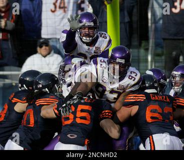 Cincinnati Bengals wide receiver Mario Alford (15), right, is tackled by Chicago  Bears linebacker Jared Allen (69) in the first half of an NFL preseason  football game, Saturday, Aug. 29, 2015, in