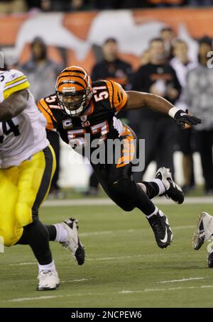 Cincinnati Bengals linebacker Dhani Jones (57) grabs the face mask