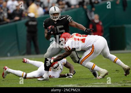 Dec 18, 2011; Oakland, CA, USA; Oakland Raiders running back Rock  Cartwright (25) warms up before the game against the Detroit Lions at O.co  Coliseum. Detroit defeated Oakland 28-27 Stock Photo - Alamy