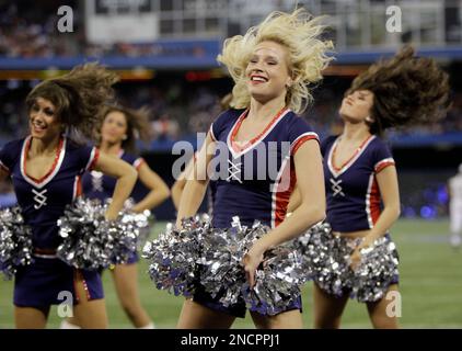 Buffalo Bills cheerleaders cheer against the Chicago Bears during the first  half of an NFL football game at the Rogers Centre in Toronto, Sunday, Nov.  7, 2010. (AP Photo/David Duprey Stock Photo 