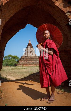 A buddhist Monk in a pagoda in Bagan Myanmar Stock Photo