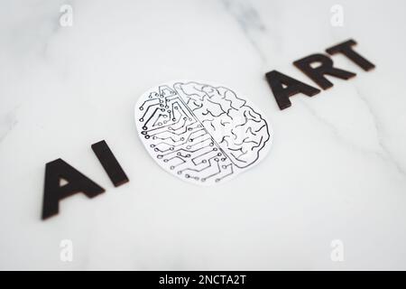 AI Art text with half human half robot brain, concept of Artificial Intelligence creating generative content based on art made by human authors Stock Photo