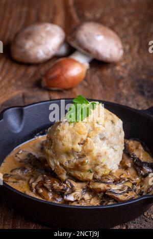 Bavarian Bread Dumpling In Mushroom Sauce Stock Photo