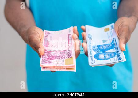 person holding the new nigerian naira notes Stock Photo