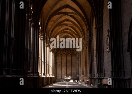 View of the ornate gothic cloister arcade arches of the Catholic Catedral de Santa Maria la Real, 15th Century Gothic Cathedral, Pamplona. Navarre, Sp Stock Photo