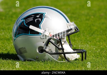 A Carolina Panthers helmet sits on the bench prior to an NFL