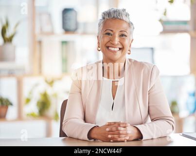 Leadership, portrait and business woman in her office sitting at a desk of a corporate company. Happy, career and face of confident professional Stock Photo