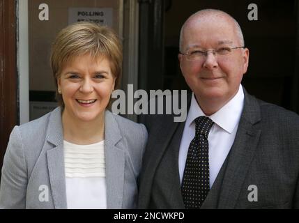 File photo dated 23/6/2016 of First Minister Nicola Sturgeon and with her husband Peter Murrell arrive to cast their votes at Broomhoouse Community Hall, Glasgow, as voters head to the polls across the UK in a historic referendum on whether the UK should remain a member of the European Union or leave. Sturgeon is expected to resign as Scottish First Minister, according to the BBC. Issue date: Wednesday February 15, 2023. Stock Photo