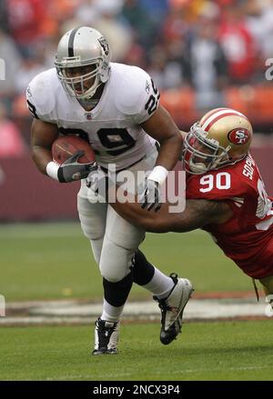 Oakland Raiders running back Michael Bush stretches during pre-game warm  ups at Invesco Field at Mile High on October 24, 2010 in Denver. UPI/Gary  C. Caskey Stock Photo - Alamy