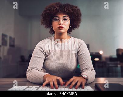 Portrait, programmer keyboard and woman typing, research or programming online at night. Information technology, computer keypad and female employee Stock Photo