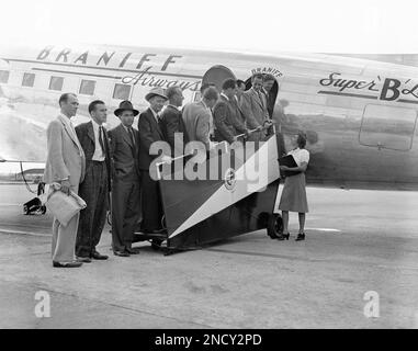 These 11 men all pilots from the west are boarding a plane in