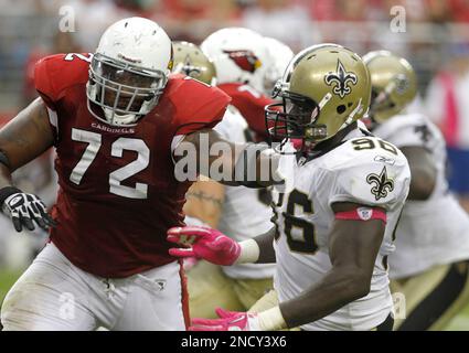 Arizona Cardinals' Brandon Keith, left, blocks Cleveland Browns