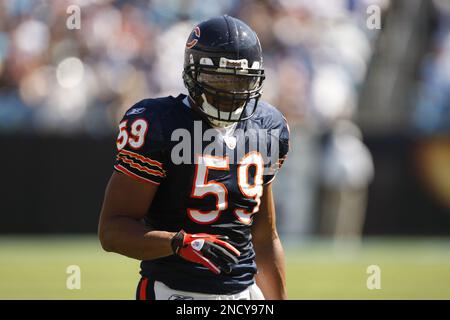 Chicago Bears linebacker Pisa Tinoisamoa (59) leaves the field