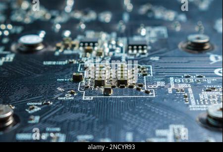 closeup of a gray motherboard with semiconductors Stock Photo
