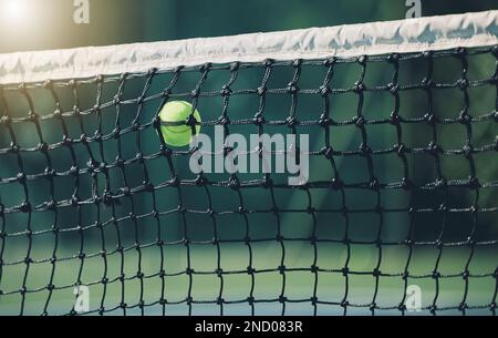 Tennis ball, air and net outdoor with space for mockup, blurred background and sunshine. Summer, sport equipment and mock up for training, fitness or Stock Photo