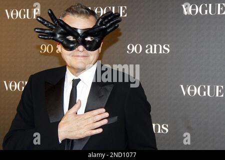 French designer Jean-Charles de Castelbajac poses for photographers as he arrives at the 90th anniversary of Vogue in Paris, Thursday, Sept. 30, 2010. (AP Photo/Laurent Cipriani)