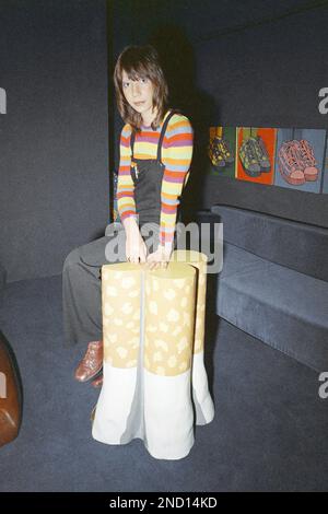 Tony Wright, a 21-year-old furniture designer from the Kings Road, Chelsea,  London, has designed lounging furniture in the modern idiom. Easy chairs  made to look like telephones, settees like bumper boots, an