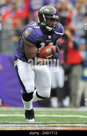 Baltimore Ravens running back Le'Ron McClain tries to escape a tackle from  Tennessee Titans Stephen Tulloch during the first half. The Titans defeated  the Ravens 13-10, at M&T Bank Stadium in Baltimore