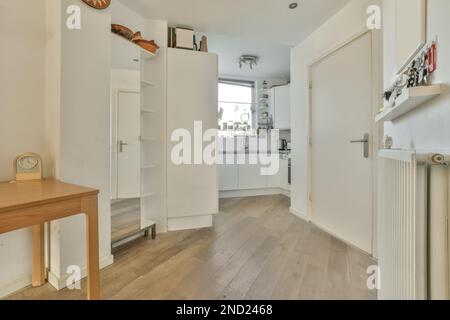 Interior of light spacious apartment with dining zone Stock Photo
