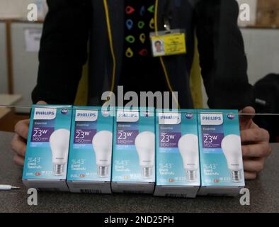 Non Exclusive: KYIV, UKRAINE - FEBRUARY 14, 2023 - Ukrainians can exchange up to five old incandescent light bulbs for energy-saving LED lamps under t Stock Photo
