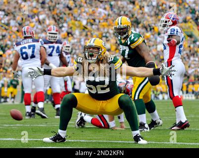 FILE - In this Sunday, Jan. 12, 1997, file photo, Green Bay Packers  defensive end Reggie White celebrates in the closing minutes of the NFC  Championship game against the Carolina Panthers at