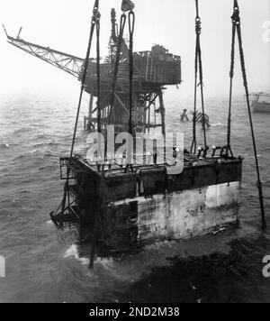 The main accommodations module of the Piper Alpha Oil Platform, as it was  raised from the North Sea bed, Saturday, Oct. 16, 1988. The four-storey  living quarters, thought to contain the remains