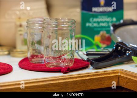 Canning venison in a northern Wisconsin kitchen. Stock Photo