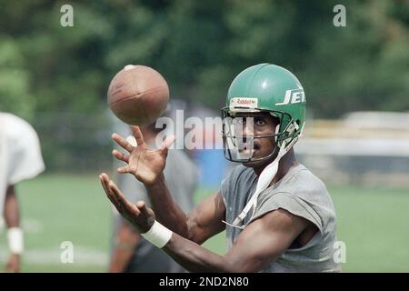 New York Jets wide receiver Art Monk catches a pass during a training camp  drill on July 26, 1994 in Hempstead, New York. Monk, who previously played  for the Washington Redskins, was